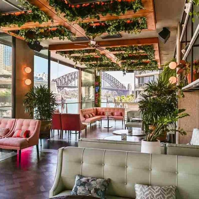 Interior of the bar with sea views at Pullman Quay Grand Sydney