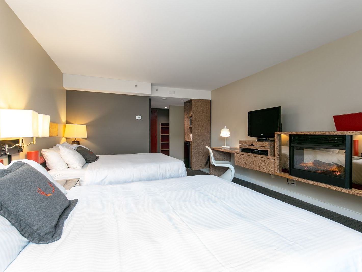 Two beds in Village View Double Queen Room, Adara Hotel