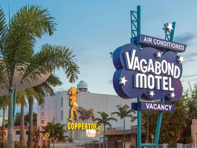 Image of the historic Vagabond sign with the Coppertone neon sig