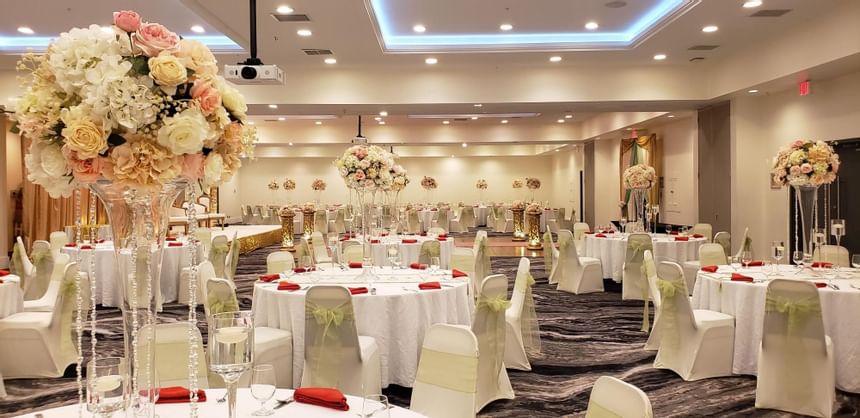 Wedding banquet table decor in the Ballroom at Harborside Hotel