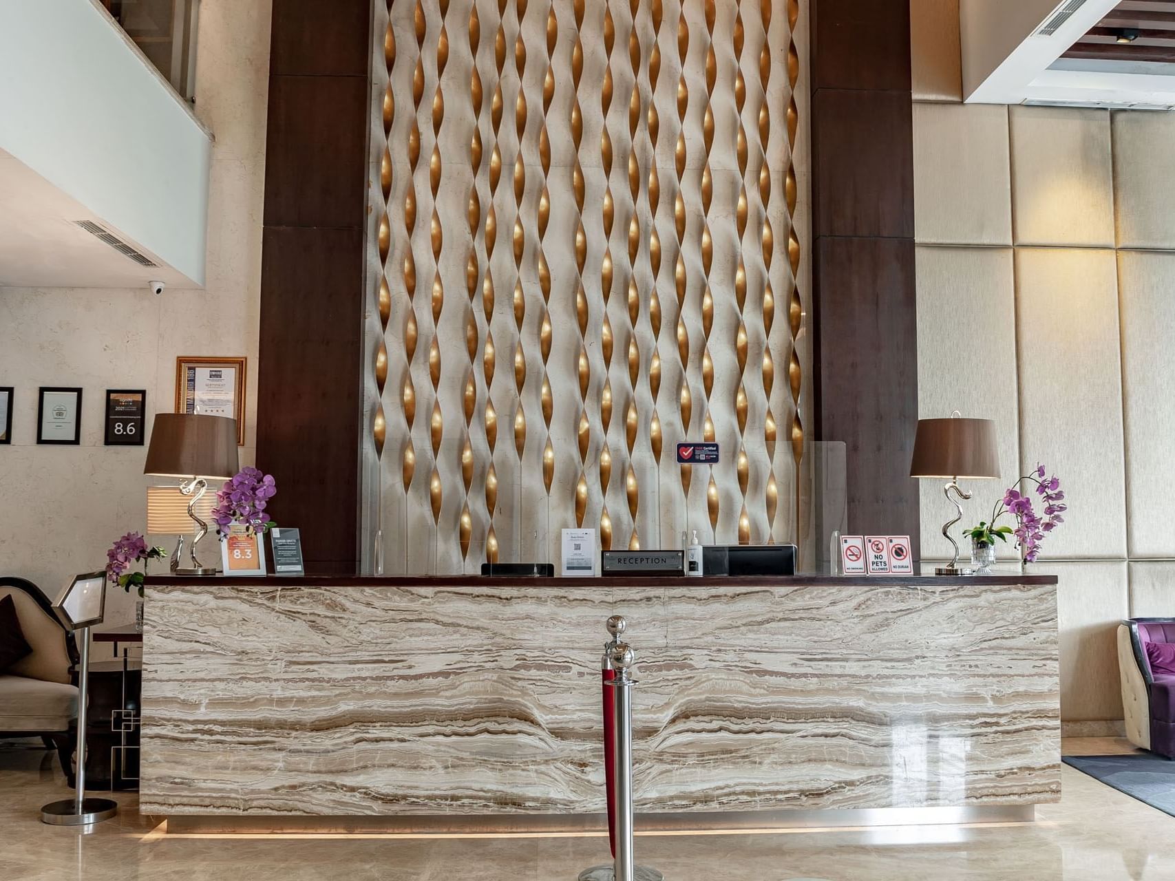 Reception area with lobby area at LK Hotel Simpang Lima