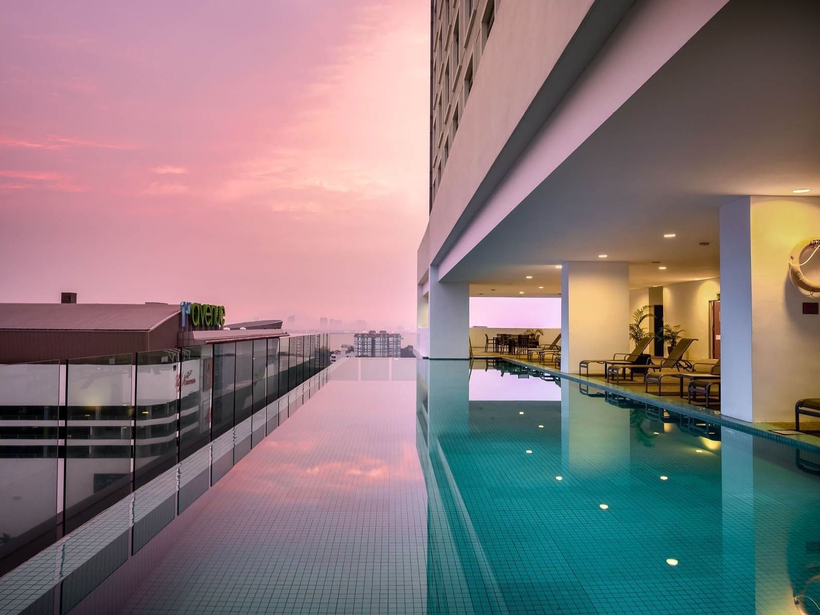 Infinity swimming pool on a balcony at St. Giles Wembley Hotel 