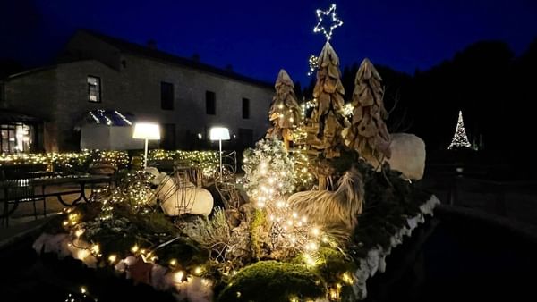 Decorated Christmas crib outdoors at Domaine de Manville