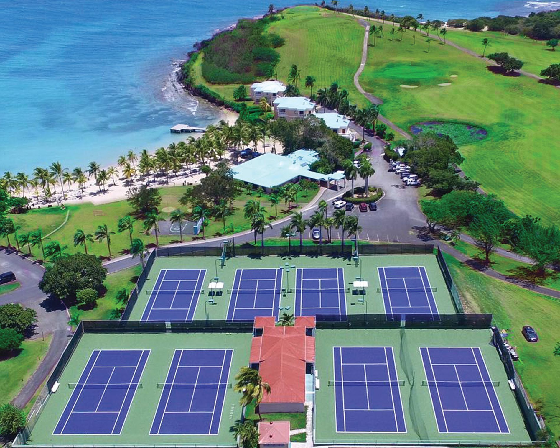 Aerial view of Tennis Courts by the ocean near Buccaneer Hotel