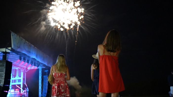 People watching fireworks at a Fourth of July event at Camp Creek Inn.