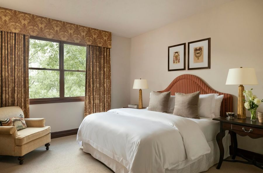 Elegant Suites at Granduca Houston, the best suite hotels in Houston, featuring plush beds and cozy seating
