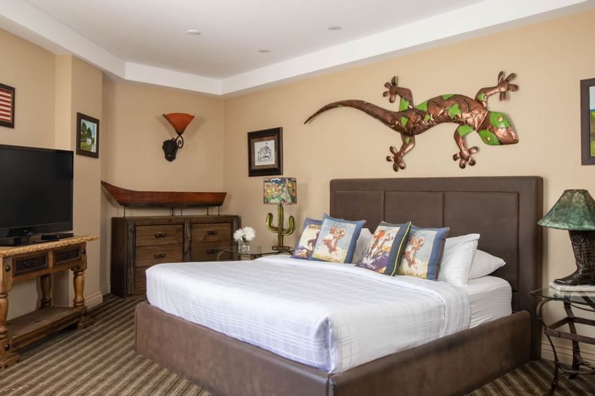 Comfy bed in King Superior Cowboy at Retro Suites Hotel