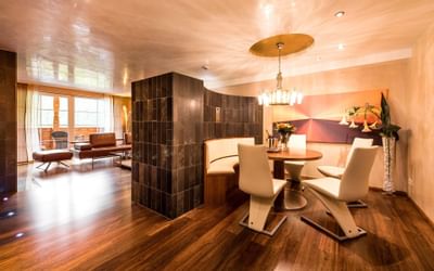 Dining area in Premium Superior Suite at Liebes Rot Flueh