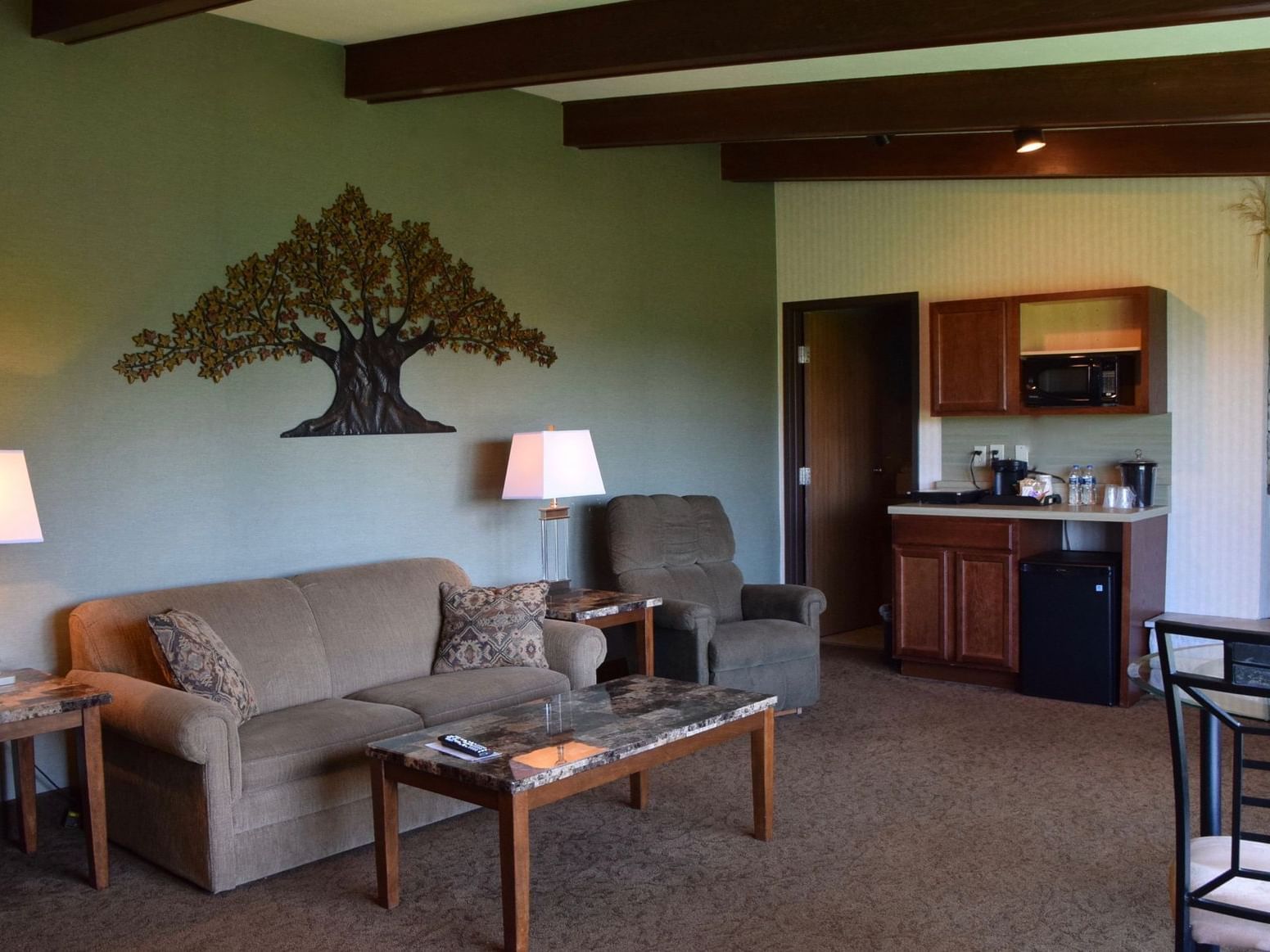 Deluxe Suite w/ Fireplace & Course View at Evergreen Resort in Cadillac.