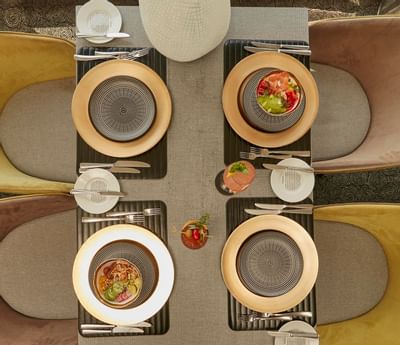 Dining setup in La Suite Lounge at St. George Lycabettus