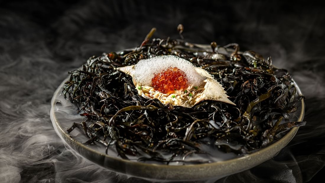 Close-up of a black cod dish served in Jeff's Cellar at The Banjaran Hotsprings Retreat