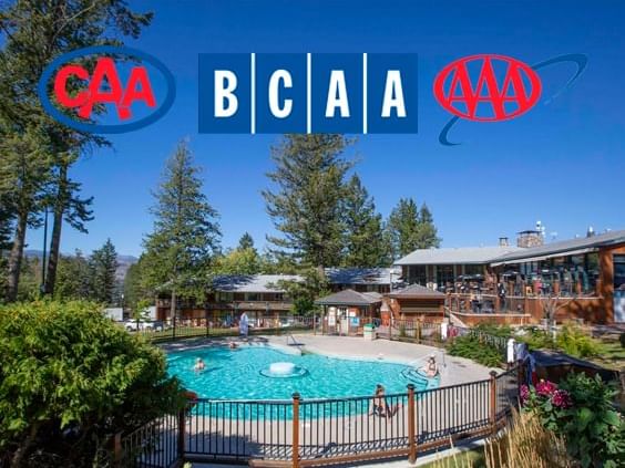 Pool area with the exterior of Fairmont Hot Springs Resort