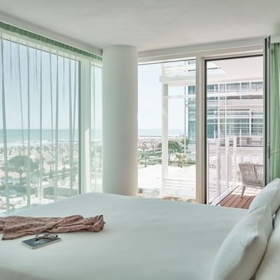 Bed in Bateo Suite Deluxe Sea view at Falkensteiner Hotels
