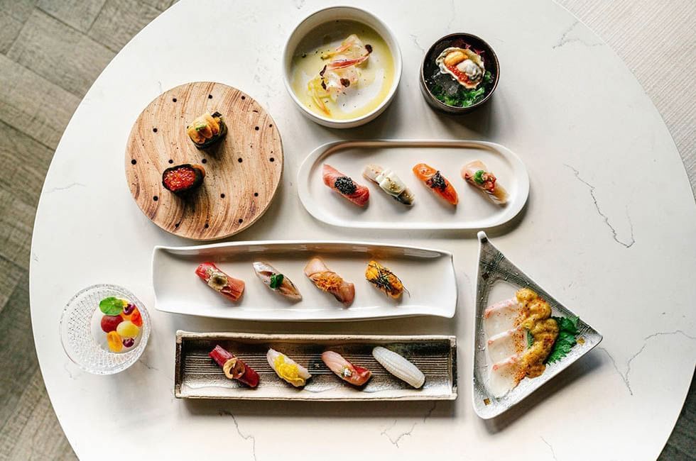 A colorful assortment of sushi and nigiri from Saishin