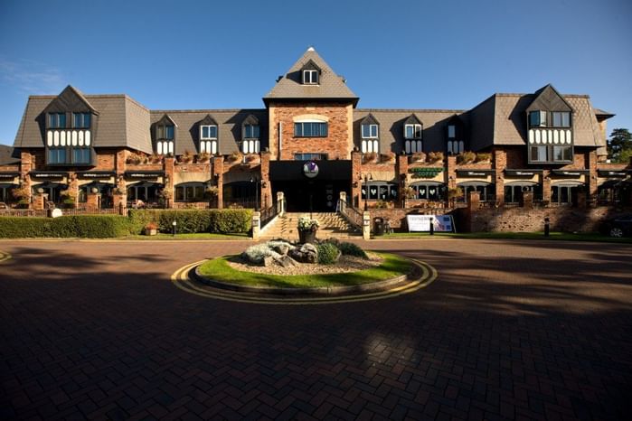 An exterior view of the hotel & main entrance at Village Hotels