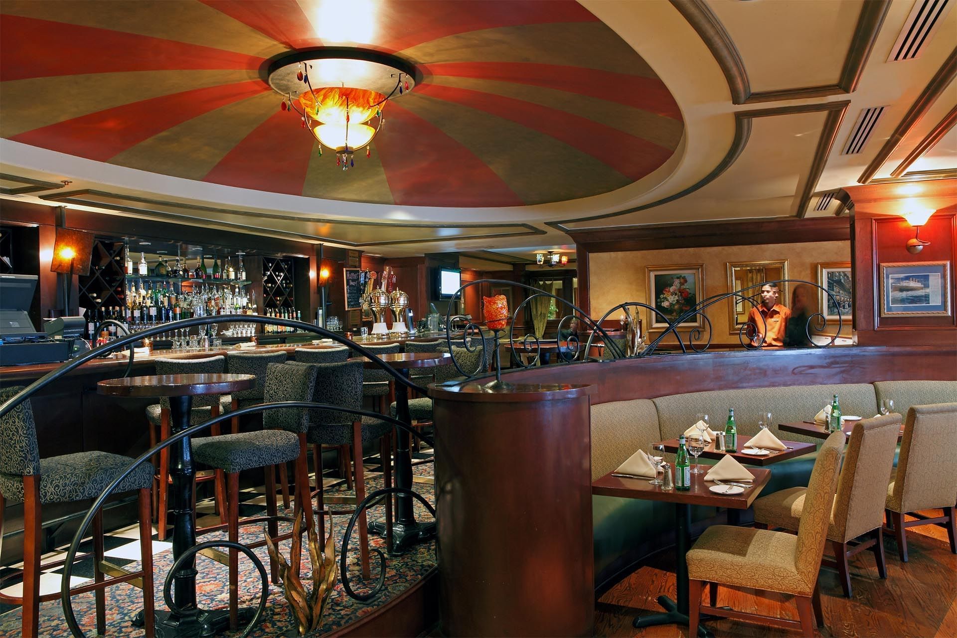 Bar counter with stools in Margaux Restaurant at Warwick Seattle