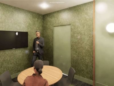 A modern room with a round table and chairs at UniLodge Brisbane City.