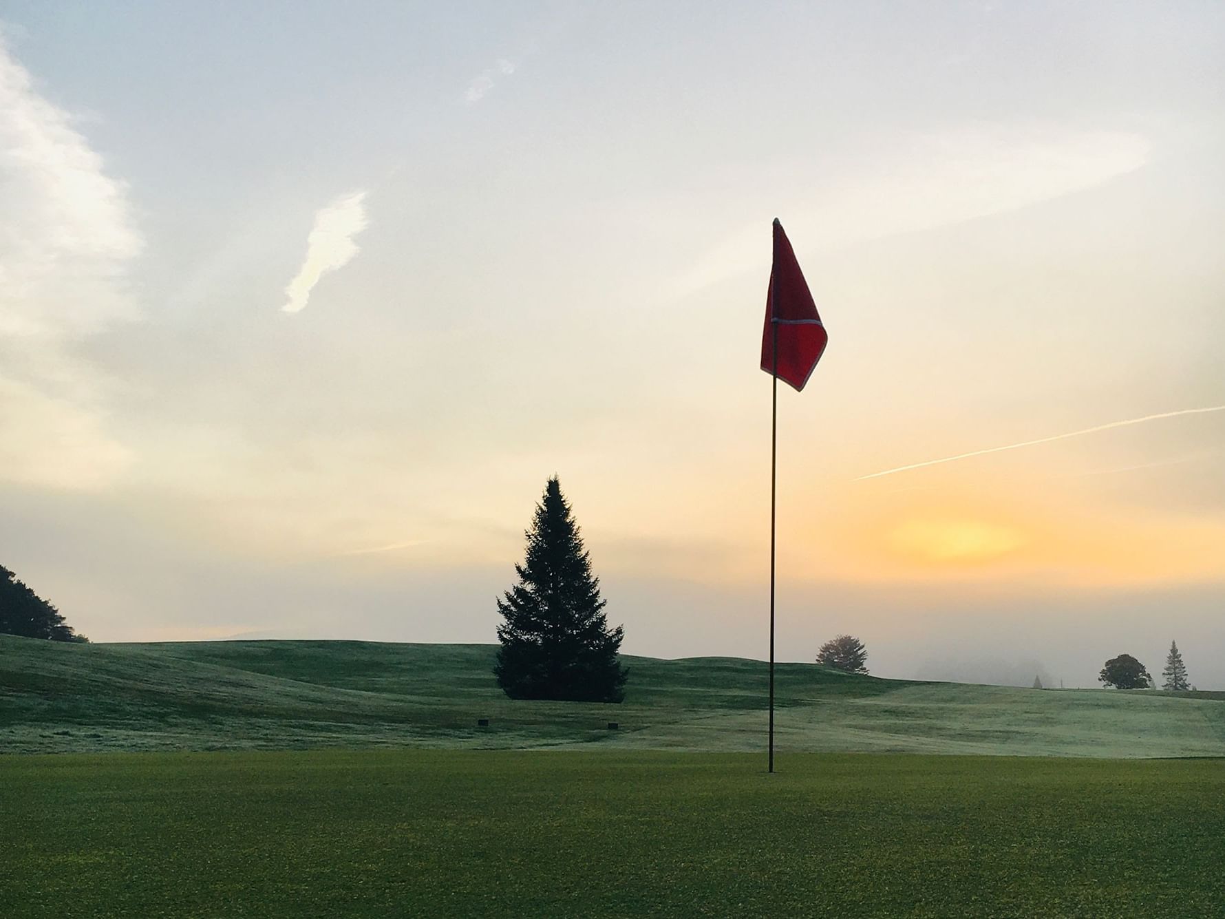Red flag on a Ryder Brook golf course.