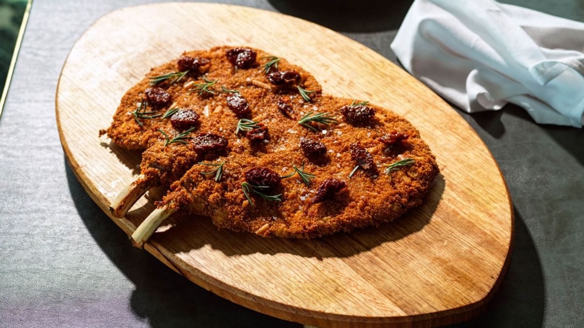 Served food on a wooden plate in a’Mare at Crown Towers Sydney