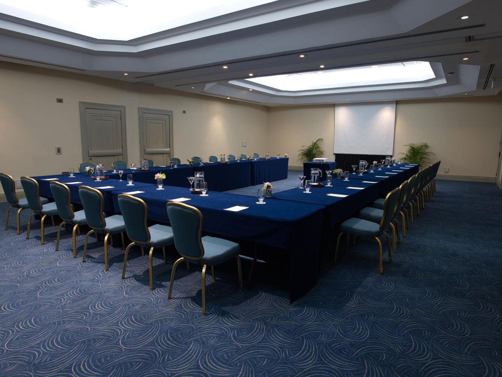 U-shaped table in Coral Kingdom Room at La Colección Resorts