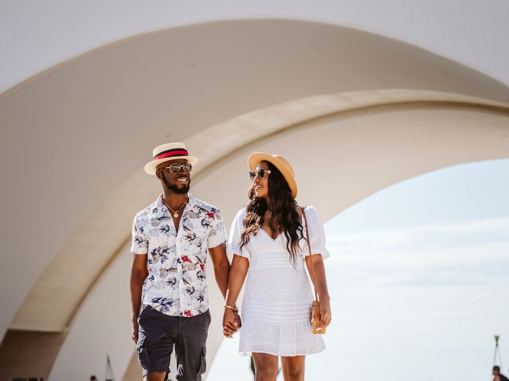 Closeup of a romantic couple holding hands at Marquis Los Cabos
