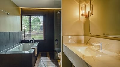 Bathtub & vanity in Pelangi Junior Suite, Pelangi Beach Resort