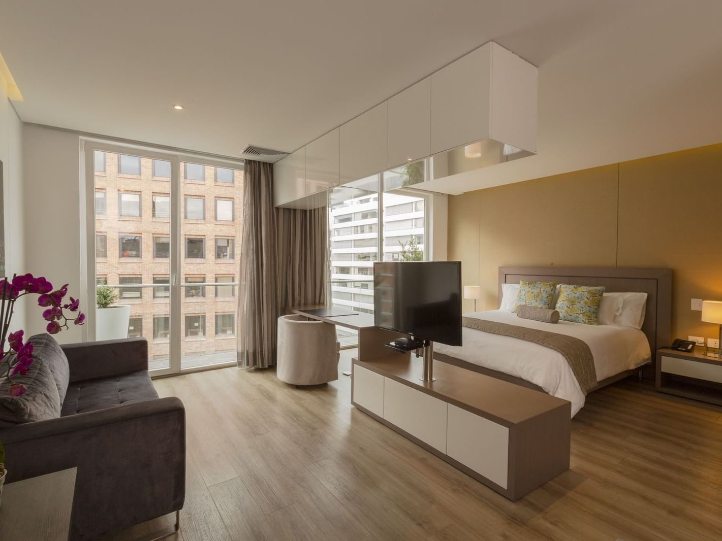 Interior of the Emerald Suite with king bed at Blue Doors Hotel