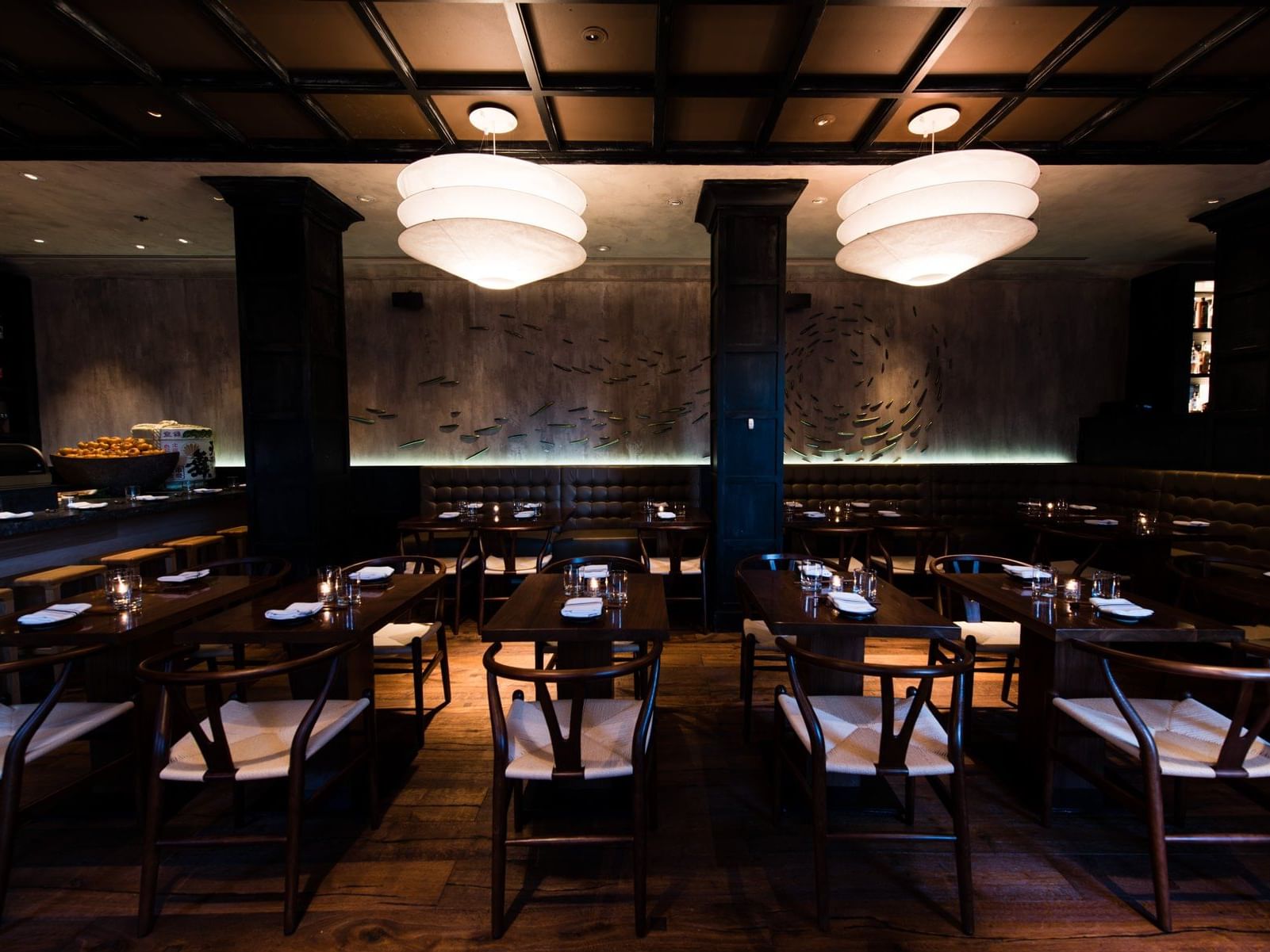 Two-seater dining tables set up in UNI Restaurant, Back Bay Boston restaurants at The Eliot Hotel