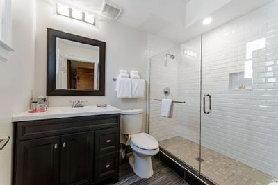 Shower area & vanity in a guest room at Artmore Hotel