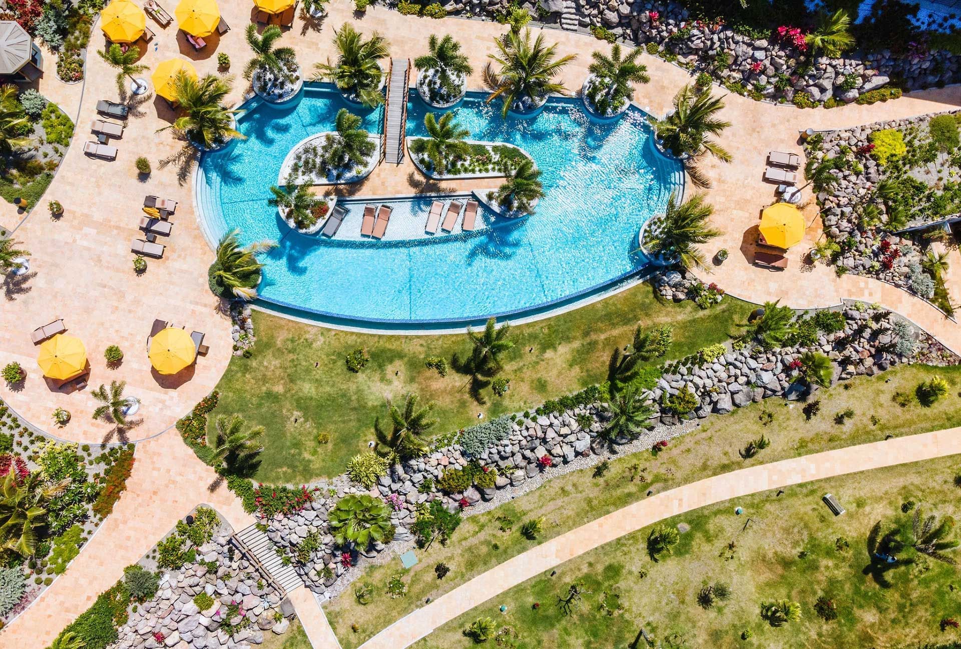 Aerial view of Sunbeds by the outdoor pool, Golden Rock Resort