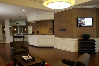 Lobby & reception area with seating at Ethan Allen Hotel
