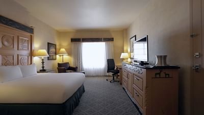 Spacious One King Bed room at Hilton Santa Fe Buffalo Thunder featuring a king bed and bright window light