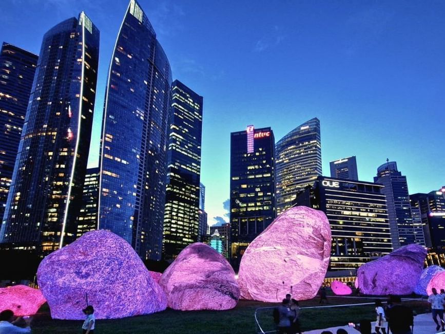 Lit large rock decor in I Light Marina Bay at night near Nostalgia Hotel Singapore