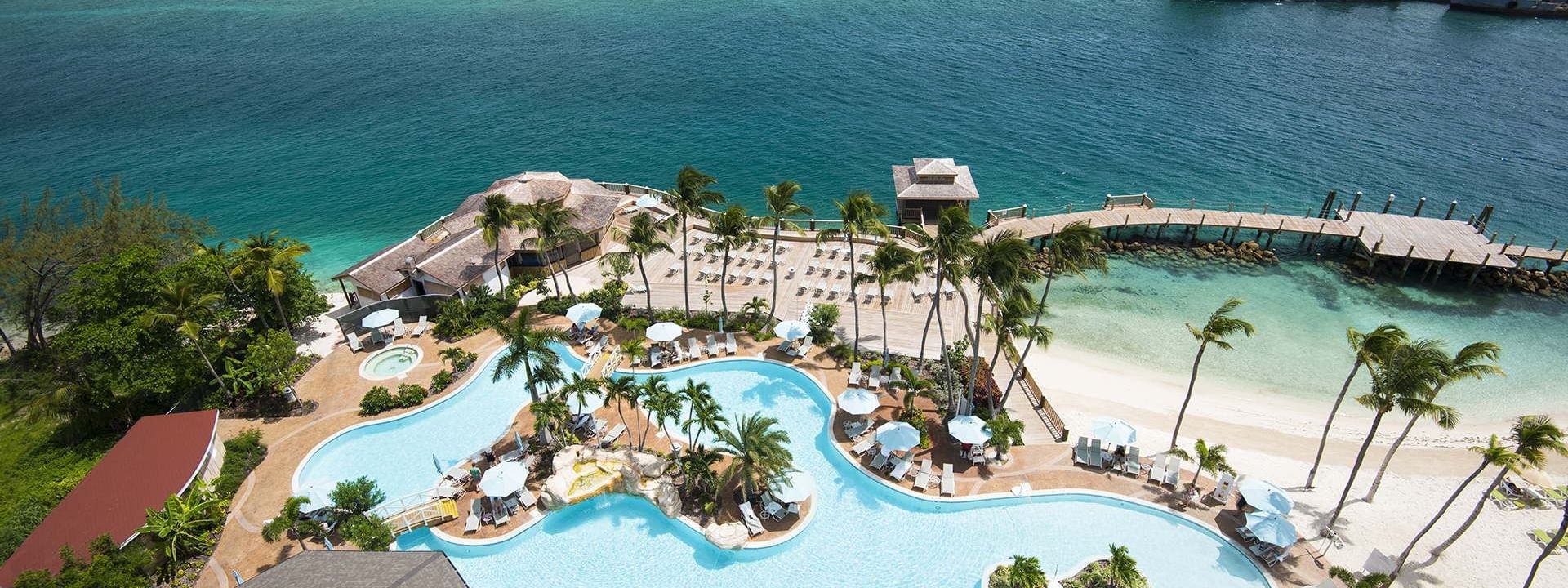 Aerial view of the hotel pool & beach at Warwick Paradise Island Bahamas