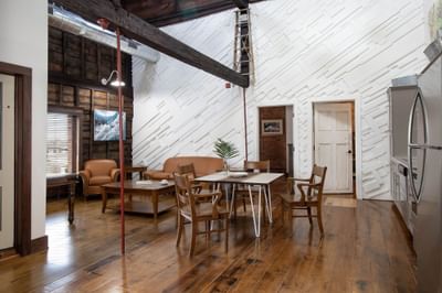 Dining table & kitchen area in Executive Residences at Retro Suites Hotel