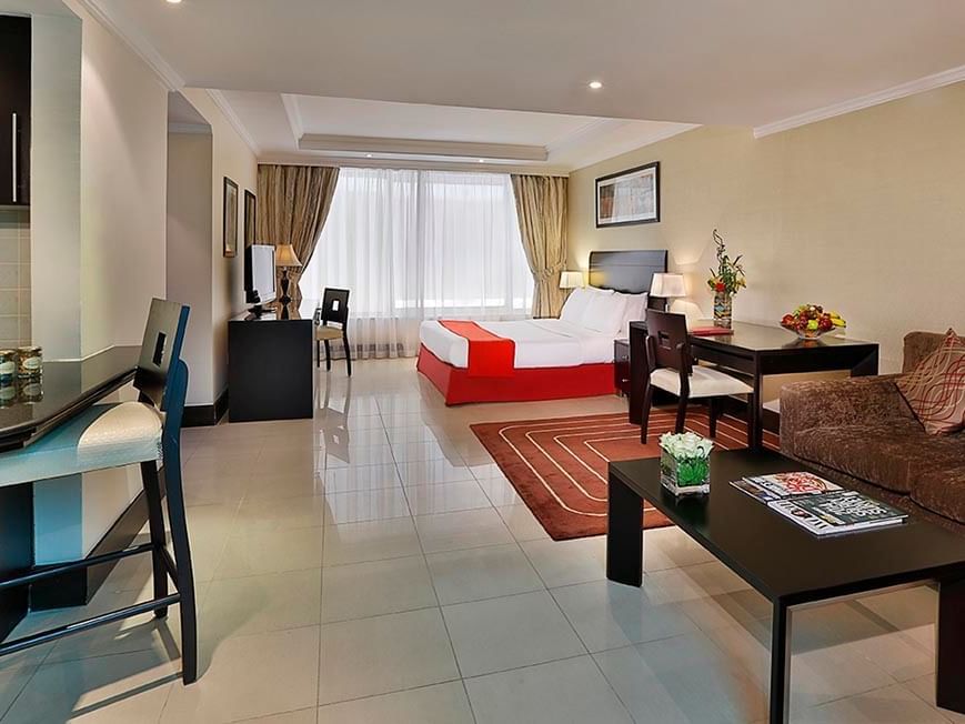 Interior view of bedroom in Junior Suite at City Seasons Hotels