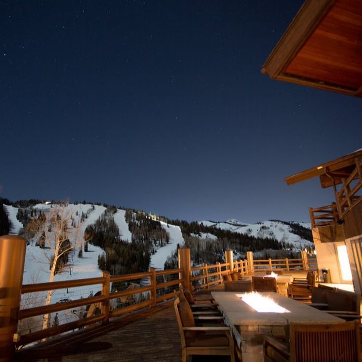 Exterior of the fire pit of deck at Stein Lodge during night