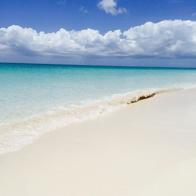 Calm sea waves near The Somerset on Grace Bay
