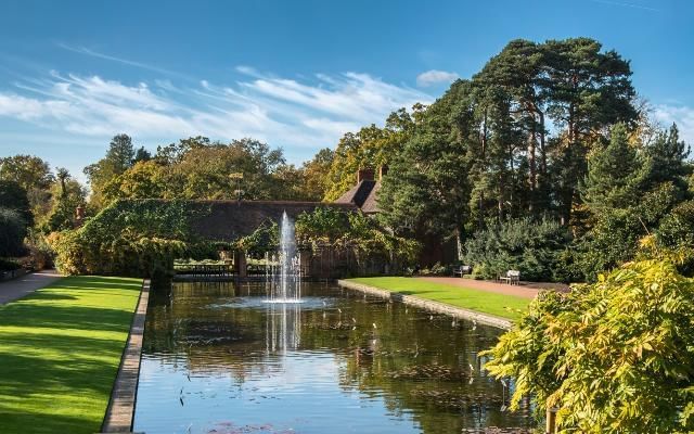 Fountain and gardens at RHS Wisley in Surrey