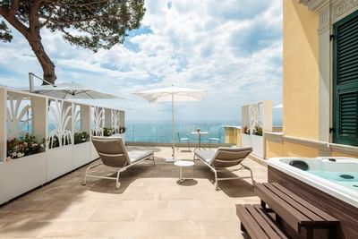 Terrace with sunbeds in Maiestas Room at Sublimis Boutique Hotel Camogli