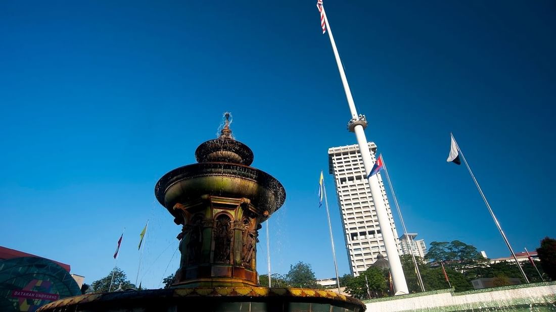 Low-angle view of fountain at Merdeka Square near Sunway Resort