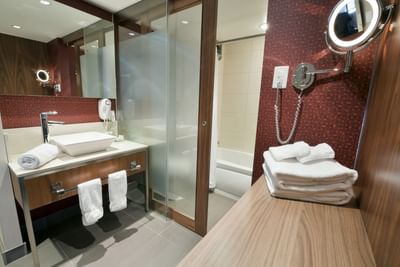 Guest bathroom vanity and tub.