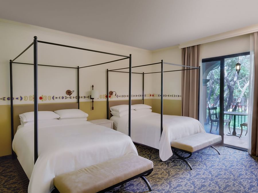 2 Double beds in Deluxe Room at FA Hacienda Galindo Resort