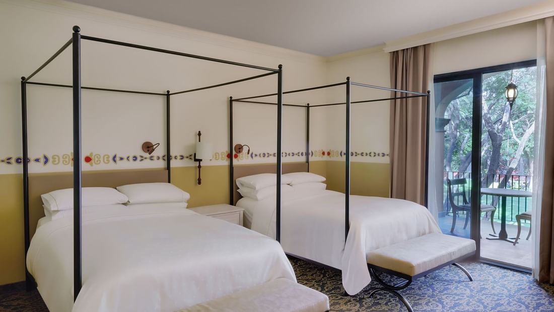 2 Double beds in Deluxe Room at FA Hacienda Galindo Resort