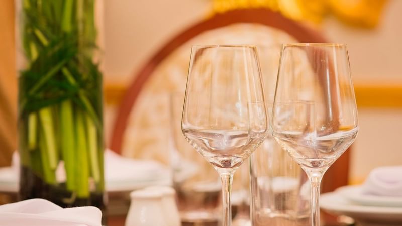 Close-up of glassware set-up in Royal Suite at Warwick Doha