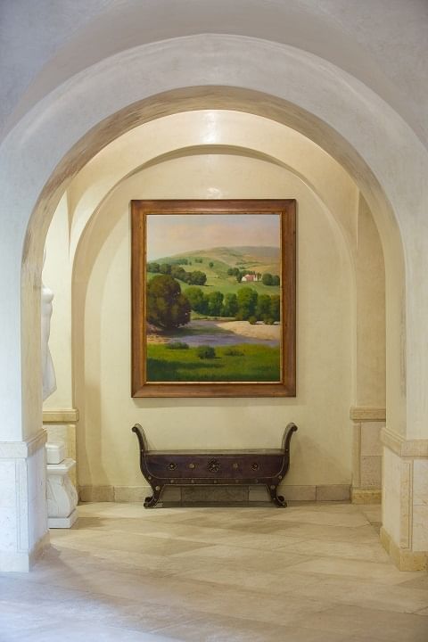 The Interior of Allegretto Vineyard Resort's arched walkways 