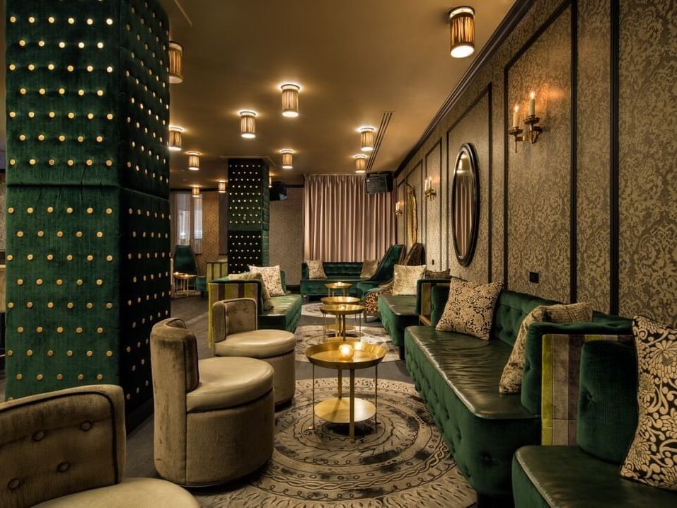 Seating area in the Rickey bar & lounge at Dream Midtown NYC