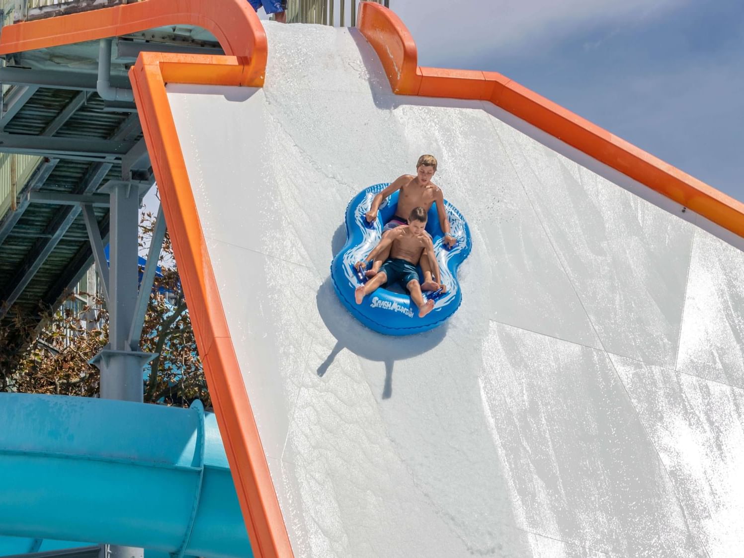 Close-up of boys on waterslide at Holiday Inn Hotel & Suites