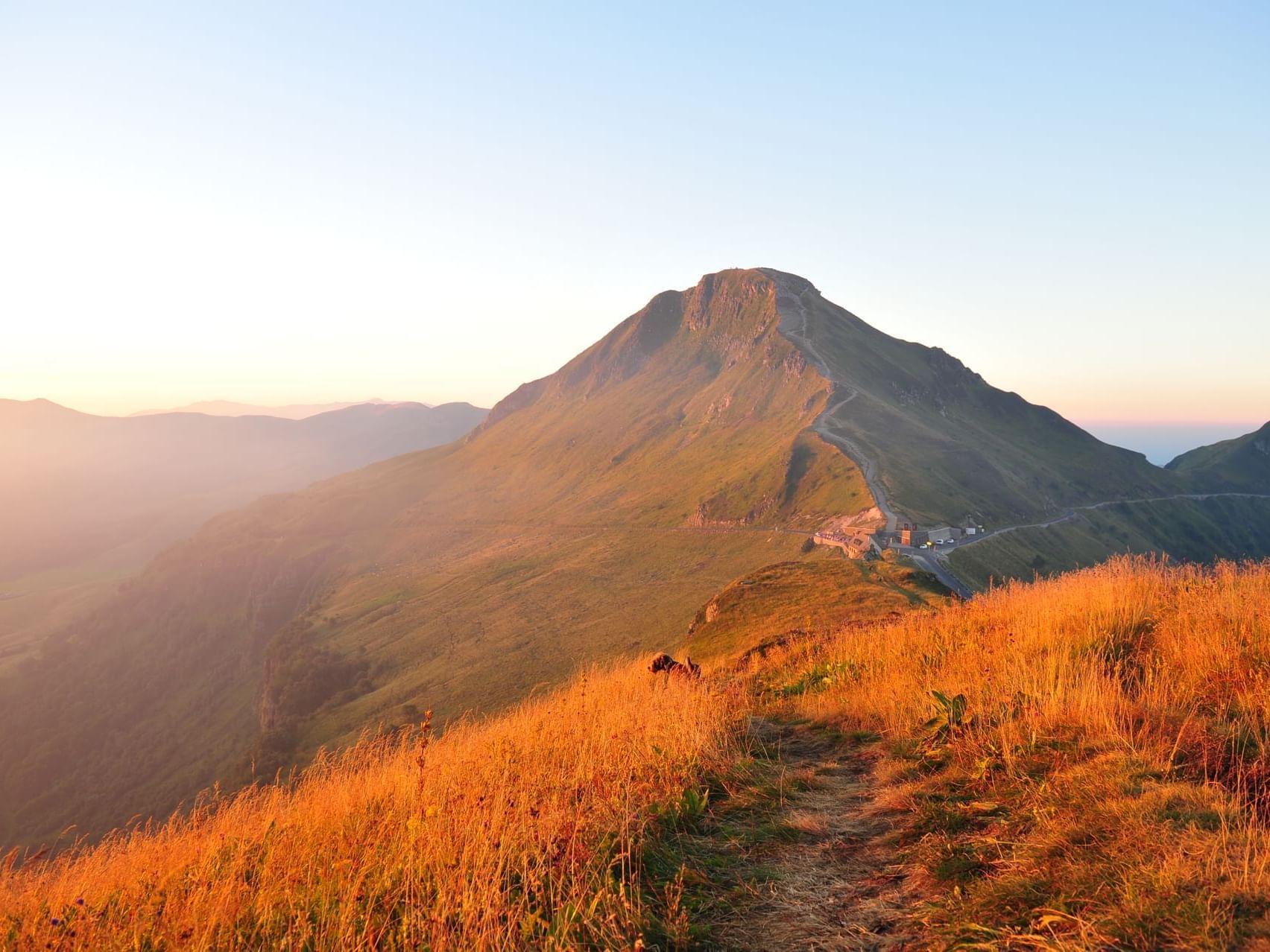 A mountain range in Mounts of Cantal near The Originals Hotels