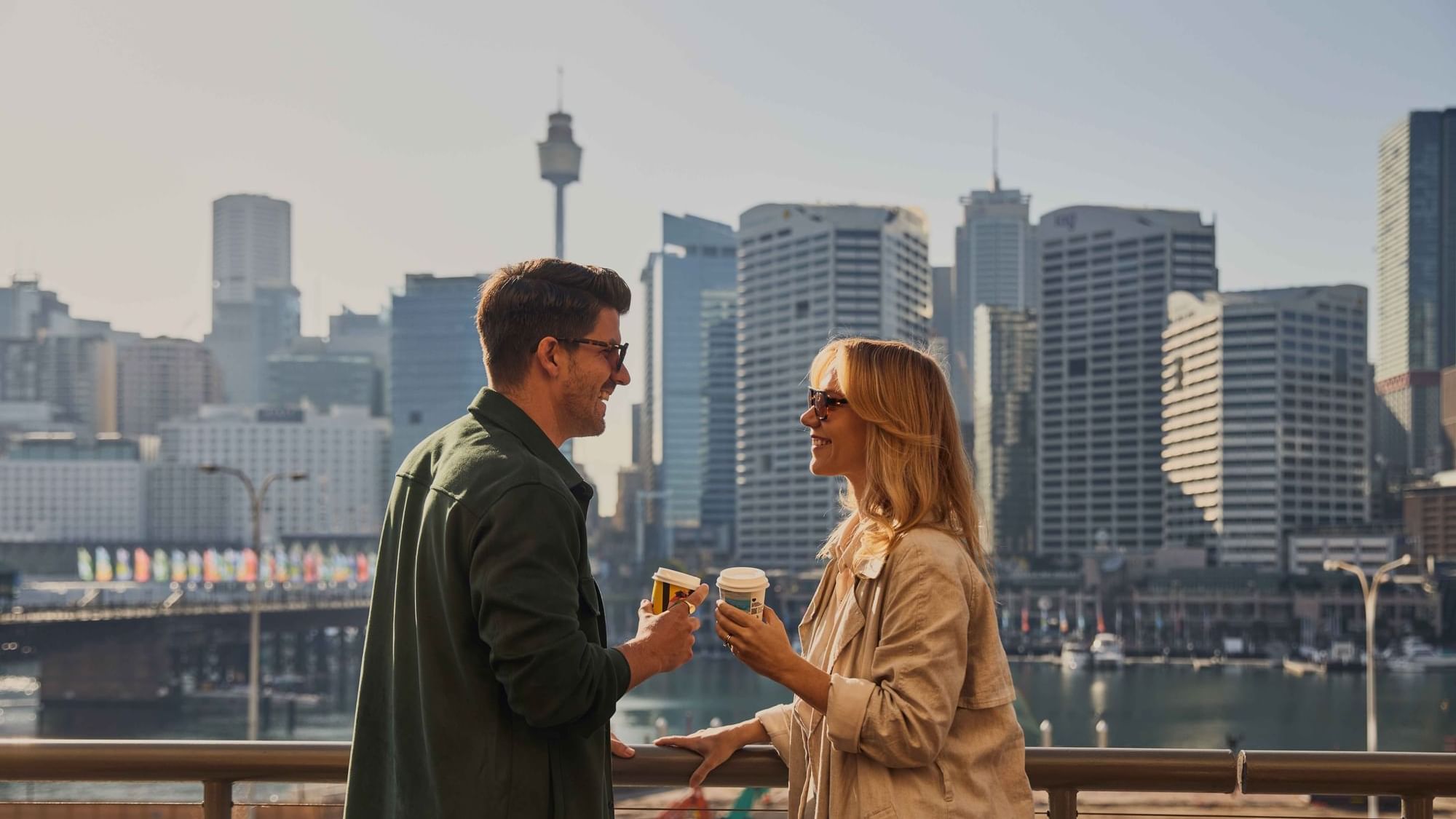Couple enjoying sunset drinks on ibis bar deck